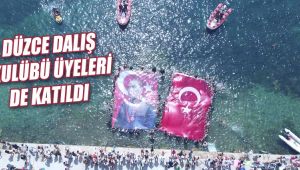 Bayrağı gören dalgalandırmak için denize atladı